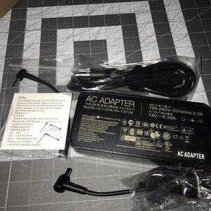 RoHS AC‎ Adapter Model: PA-1121-28 Input 100-240V~50-60Hz Output 19V